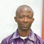 Augustin Igilma's passport photo